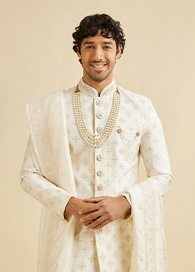 alt message - Manyavar Men Warm White Floral Self Patterned Sherwani Set image number 0